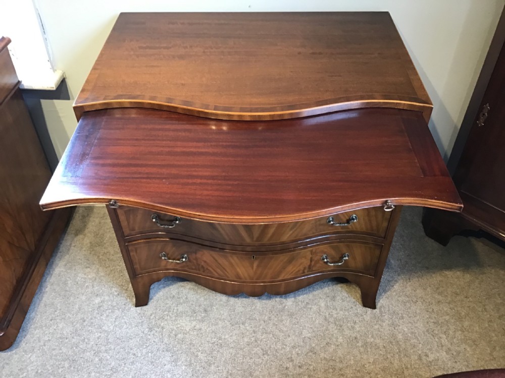 Antique serpentine chest of drawers View VII
