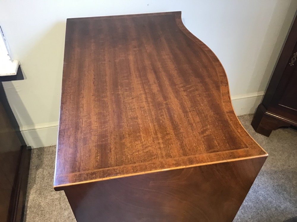 Antique serpentine chest of drawers View IX