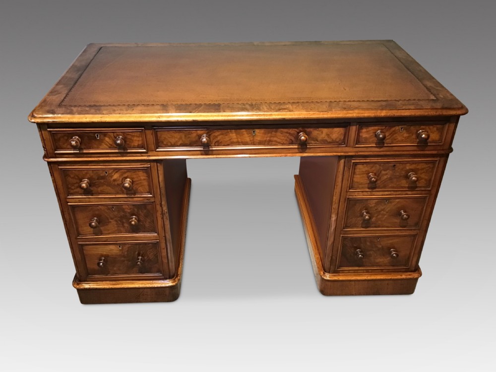 Antique walnut pedestal desk