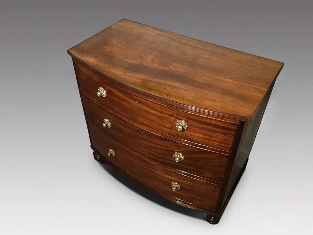 Antique bow chest of drawers View II