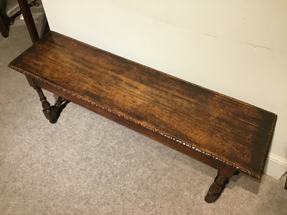 An antique oak hall bench View III
