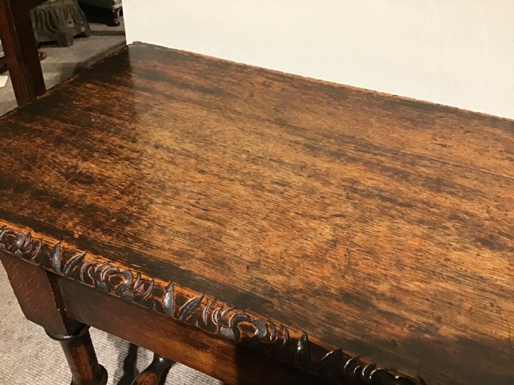 An antique oak hall bench View VII