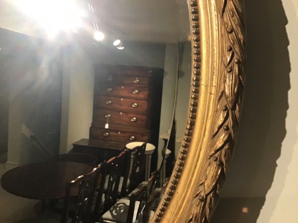 Antique oval wall mirror View III