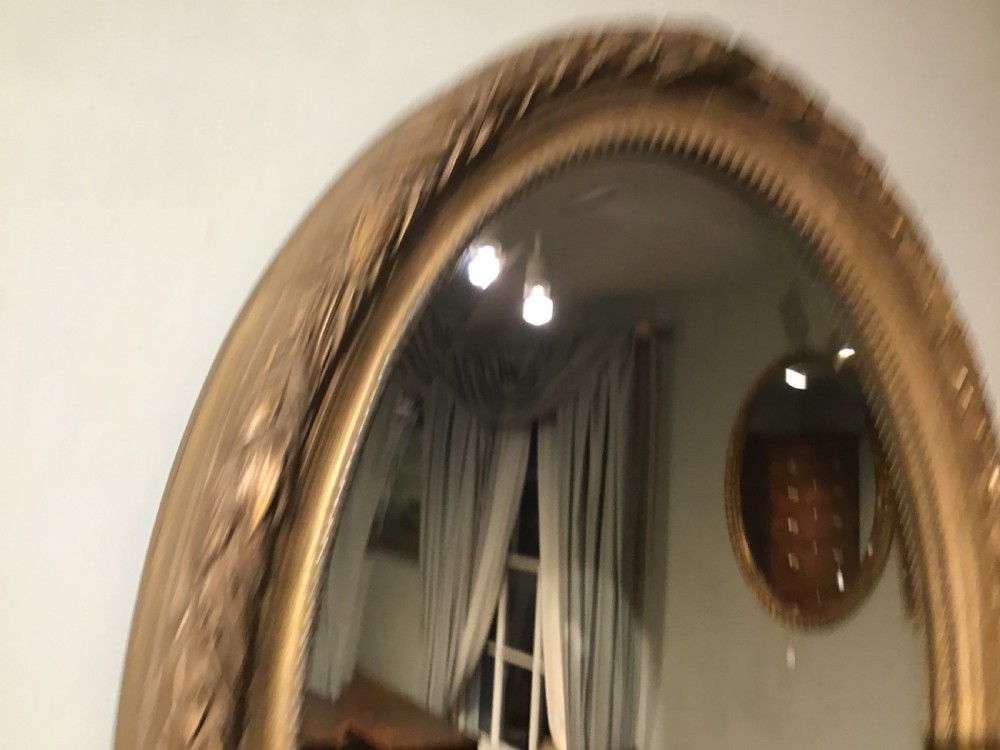 Antique oval wall mirror View V