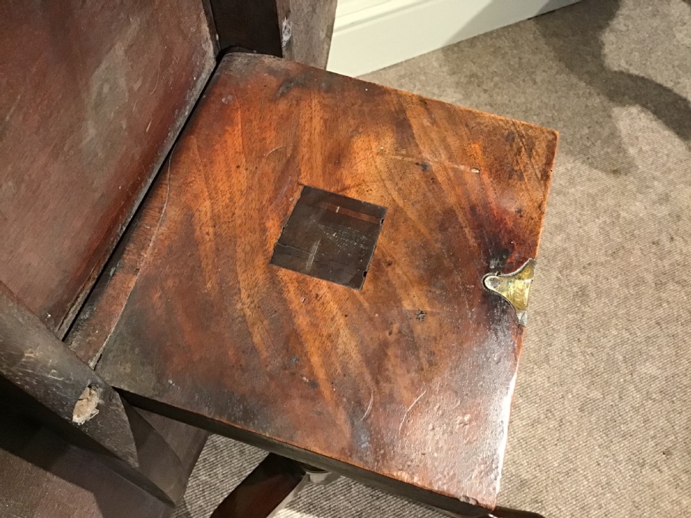 A Georgian mahogany tripod table featuring a smooth circular top supported by a turned central pedestal and three cabriole legs. View IX