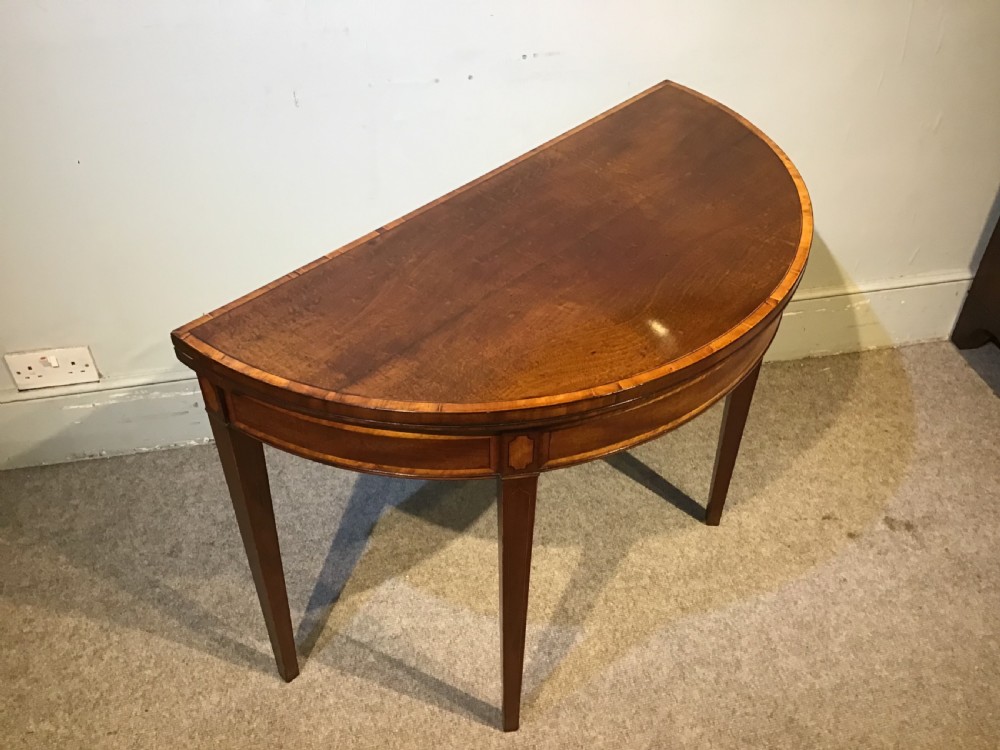 A Geo III mahogany card table View II