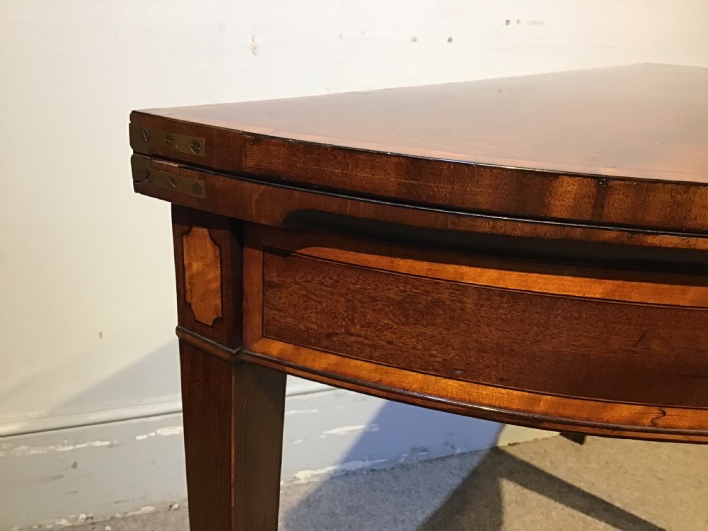 A Geo III mahogany card table View VI
