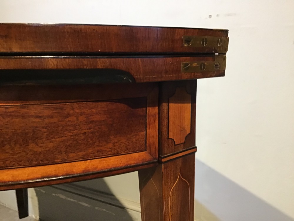 A Geo III mahogany card table View X