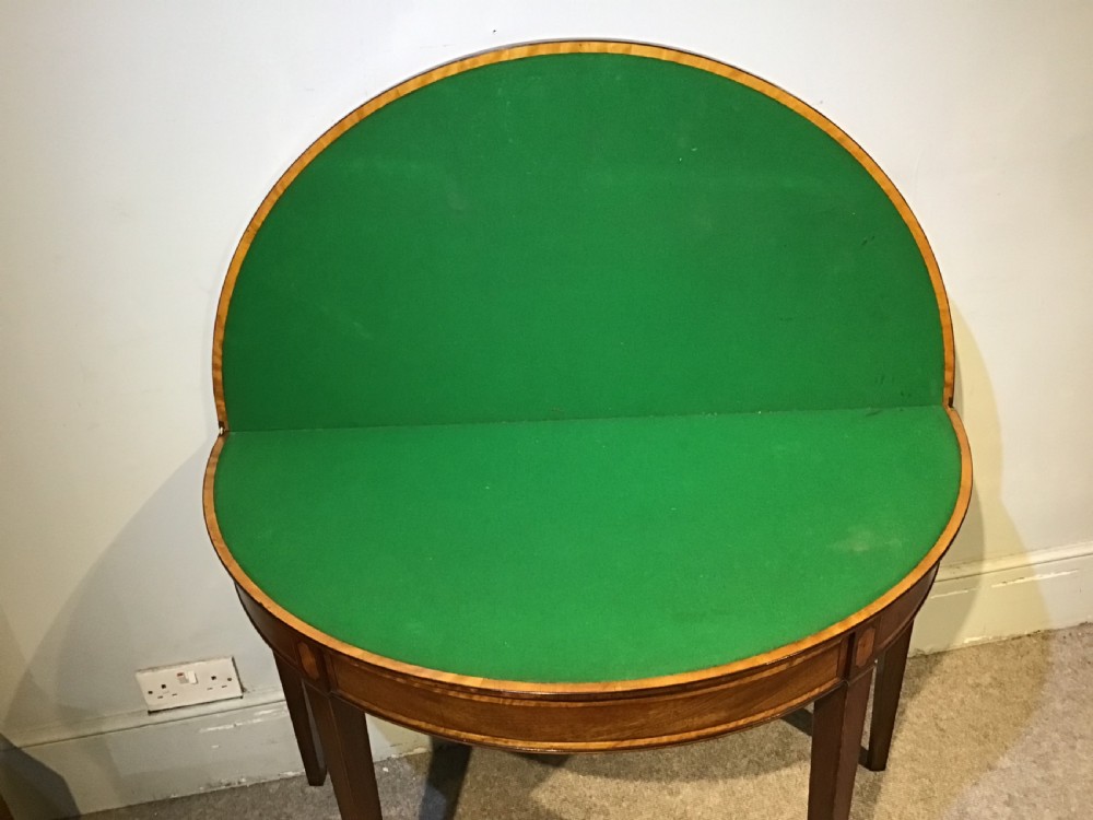 A Geo III mahogany card table View XI