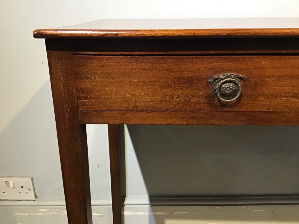 An antique Georgian mahogany side table featuring two drawer compartments with brass ring handles, boxwood inlaid border detail, and four square tapered legs. View VIII