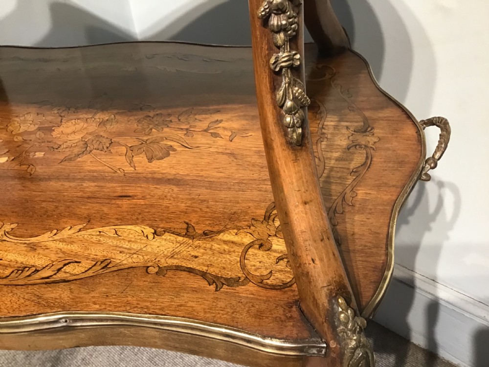 A two-tiered French etagere table featuring floral marquetry inlay, decorative brass mounts, and slender cabriole legs. View VIII