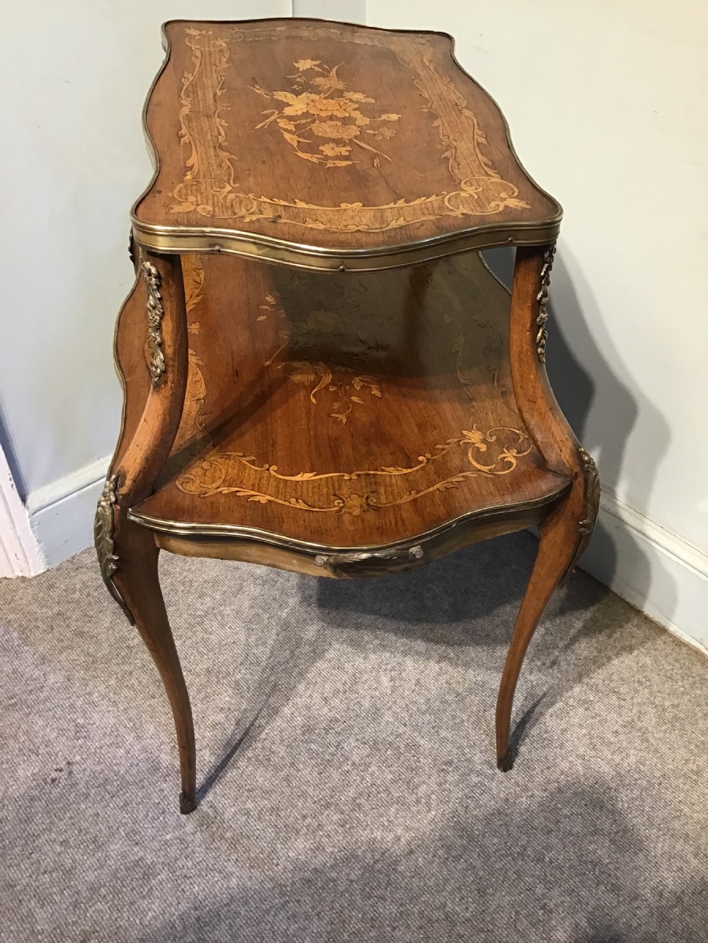 A two-tiered French etagere table featuring floral marquetry inlay, decorative brass mounts, and slender cabriole legs. View XII