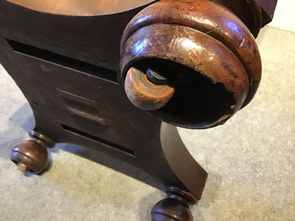 A Regency period flame mahogany fold-over card table featuring a carved pedestal column, a quadruped platform base, and scroll corner brackets. View XIV