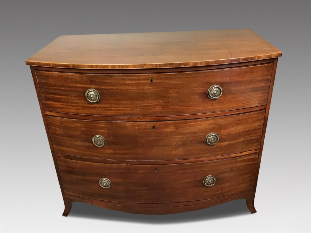 Antique mahogany bow front chest of drawers