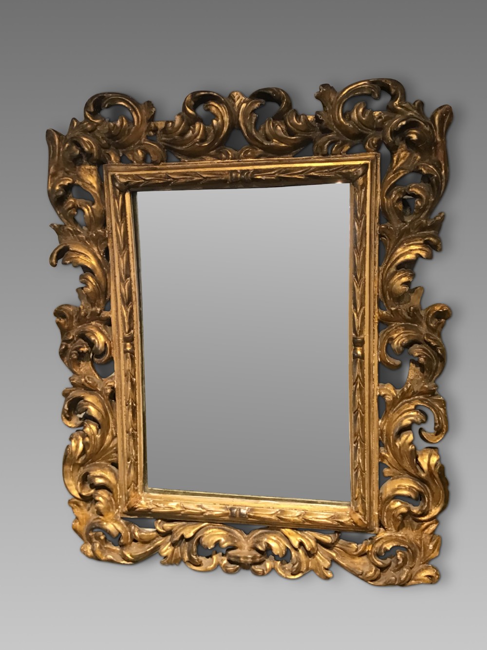 Antique carved giltwood mirror