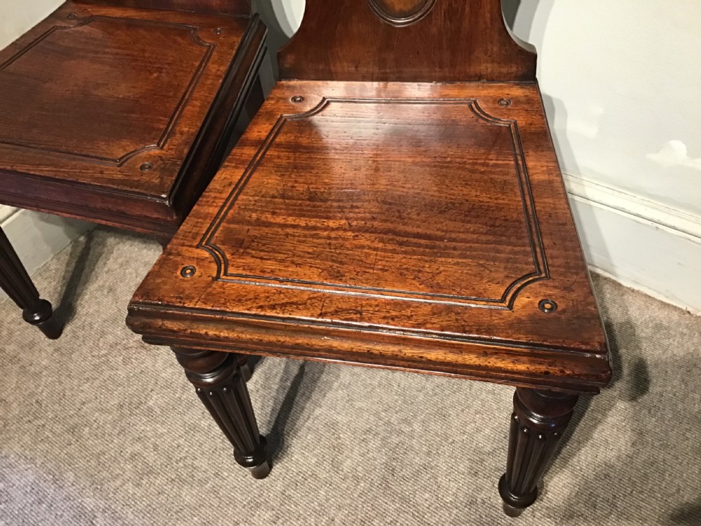 Pair of antique mahogany hall chairs  View III