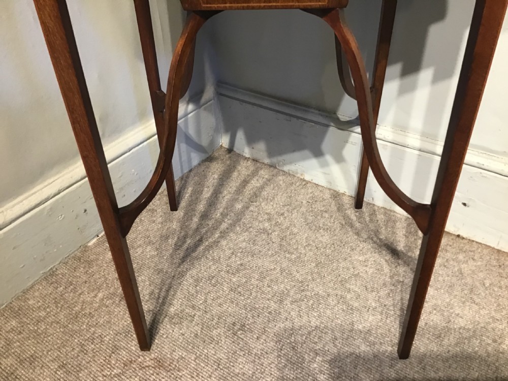 An antique inlaid mahogany work table View III