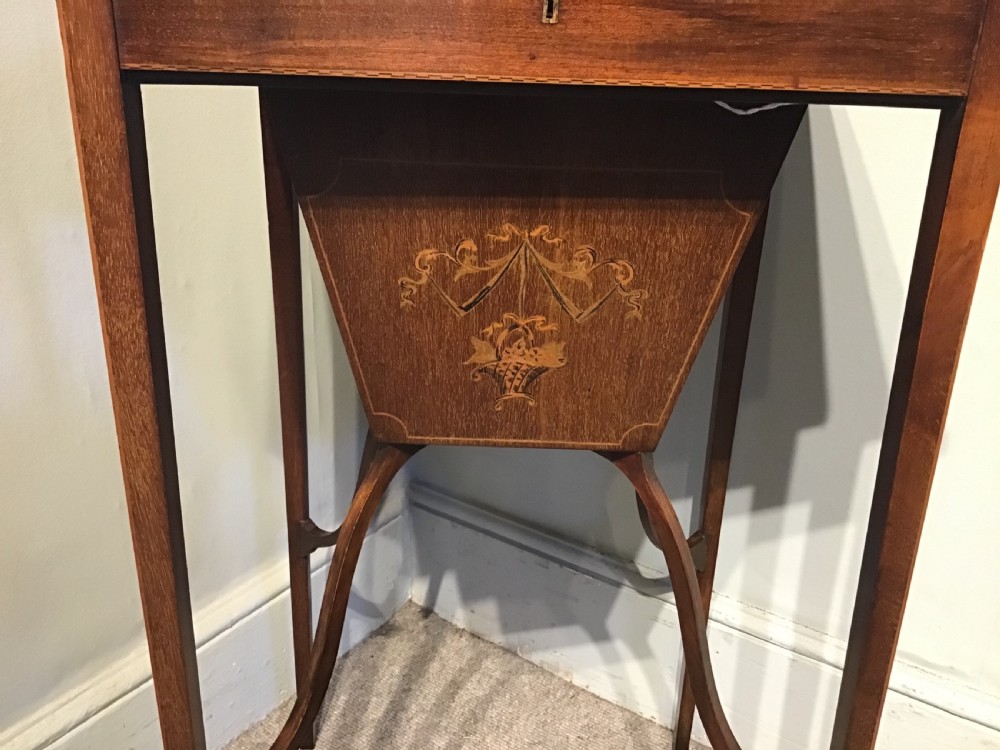 An antique inlaid mahogany work table View IV