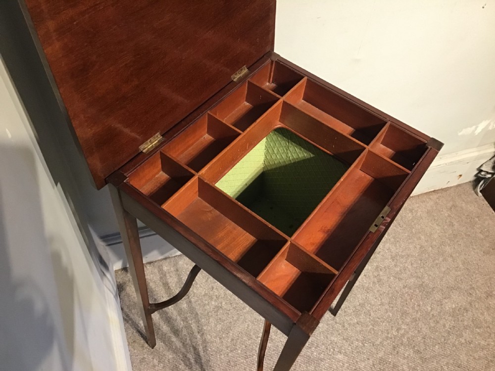 An antique inlaid mahogany work table View VI