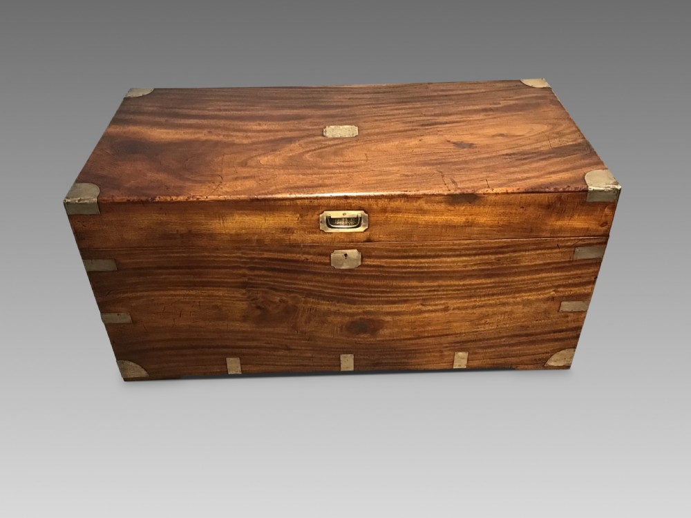 An antique campaign trunk