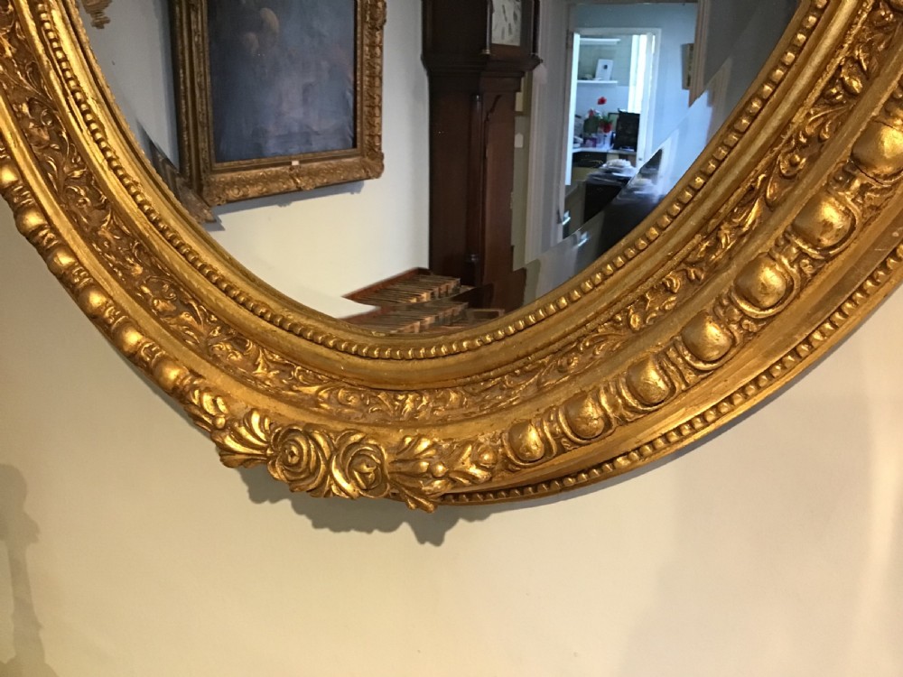 Antique oval gilt mirror View II