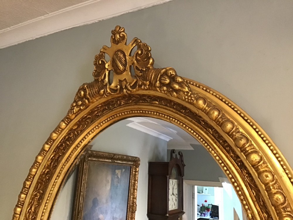 Antique oval gilt mirror View III