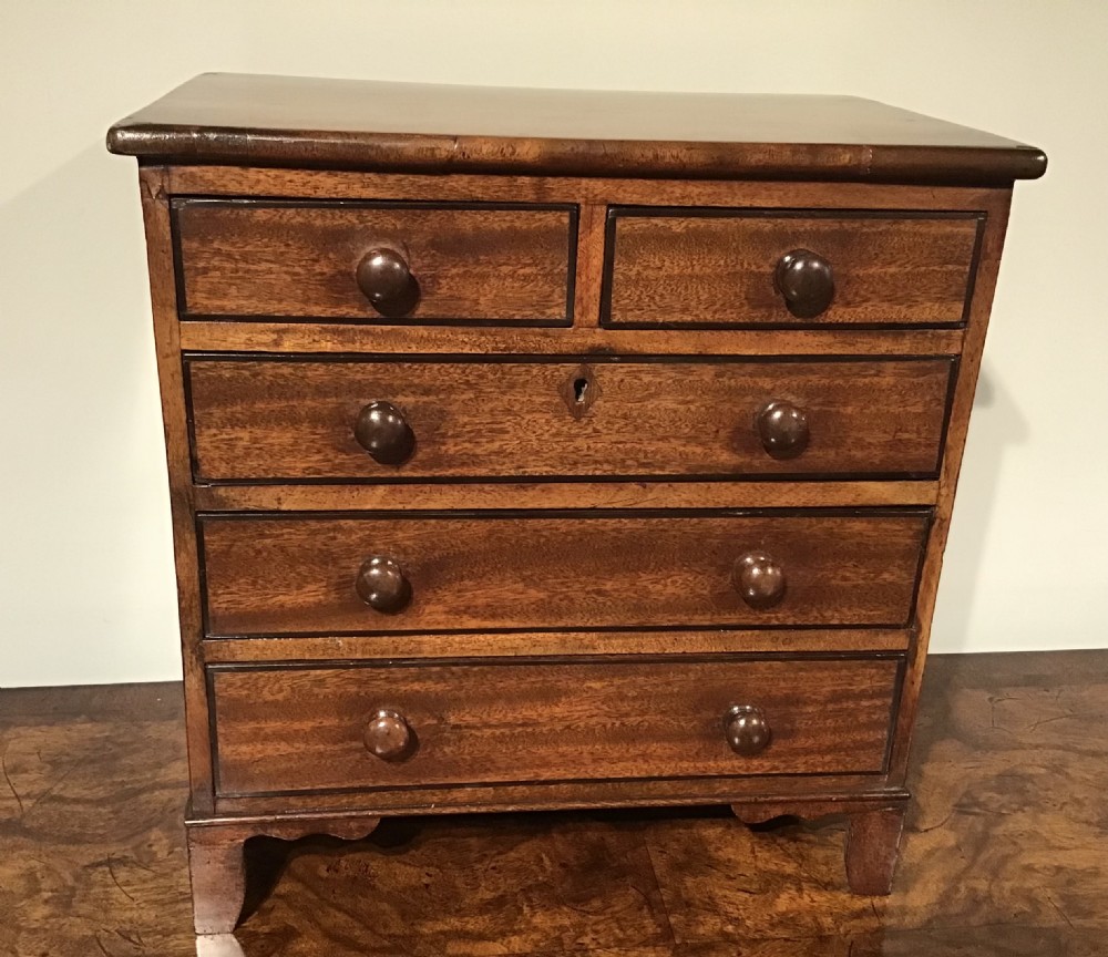 Antique miniature chest of drawers