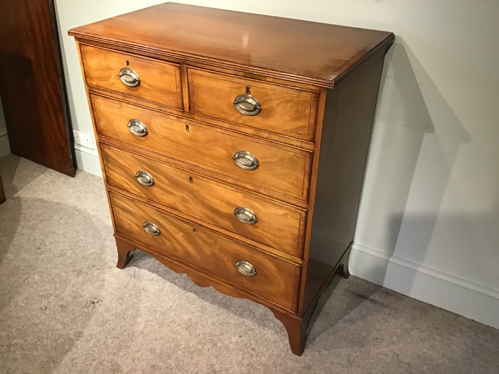 An antique mahogany chest of drawers View III