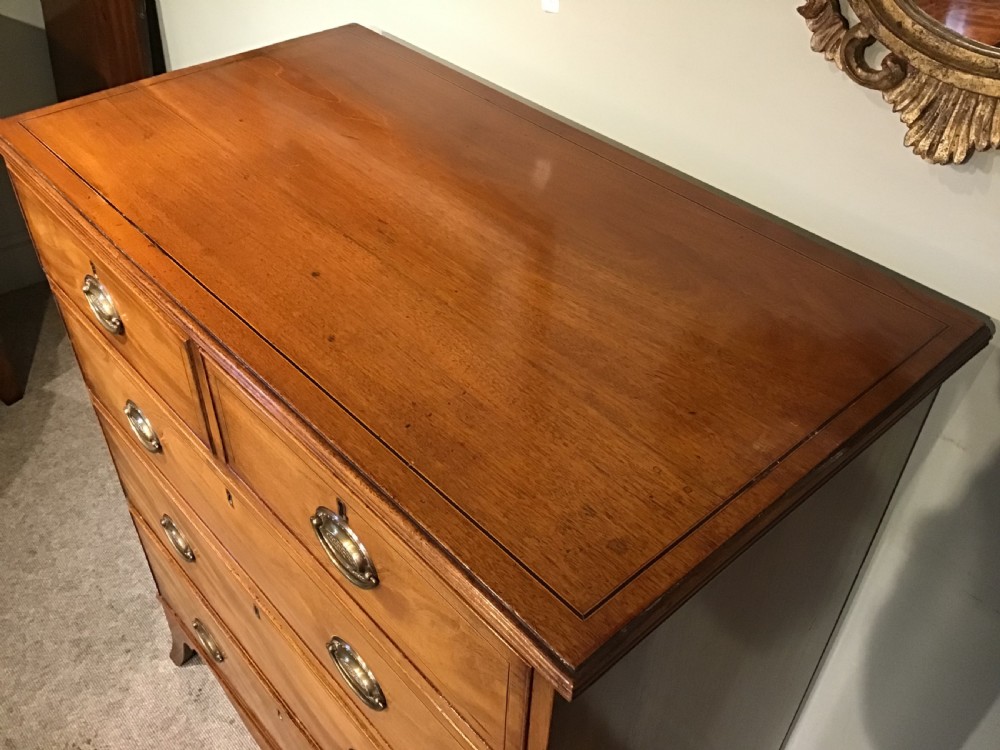 An antique mahogany chest of drawers View V