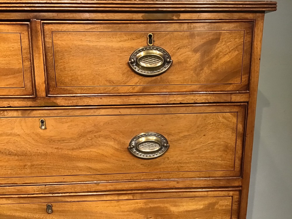 An antique mahogany chest of drawers View VIII