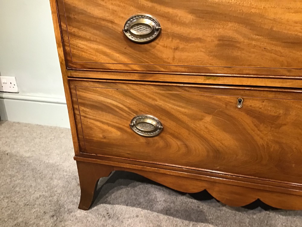 An antique mahogany chest of drawers View X