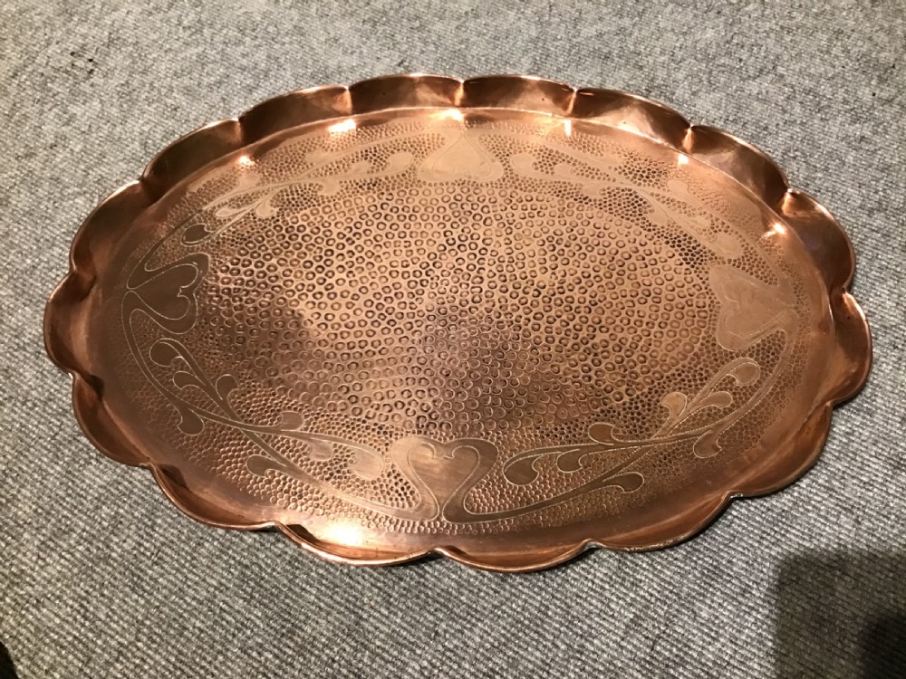 Set of four copper trays View V