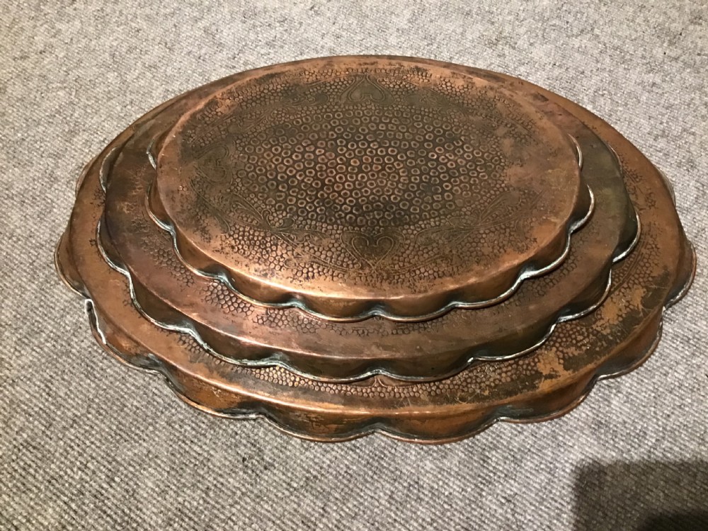Set of four copper trays View VIII