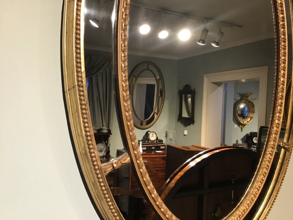 Antique oval gilt mirroe View III
