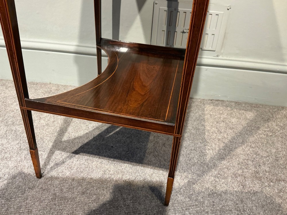 A late Georgian Sheraton mahogany work table featuring satinwood crossbanding, a single drawer, tapered square legs, and a concave lower undertier. View X
