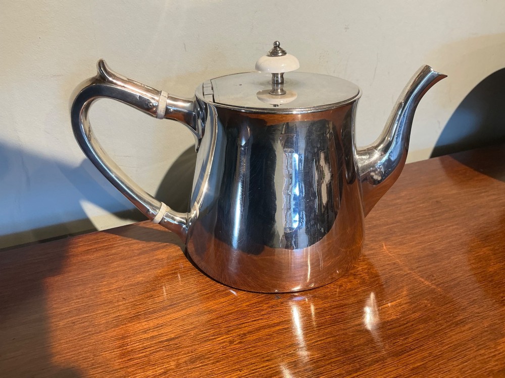 Robert Garrard sterling silver teapot.