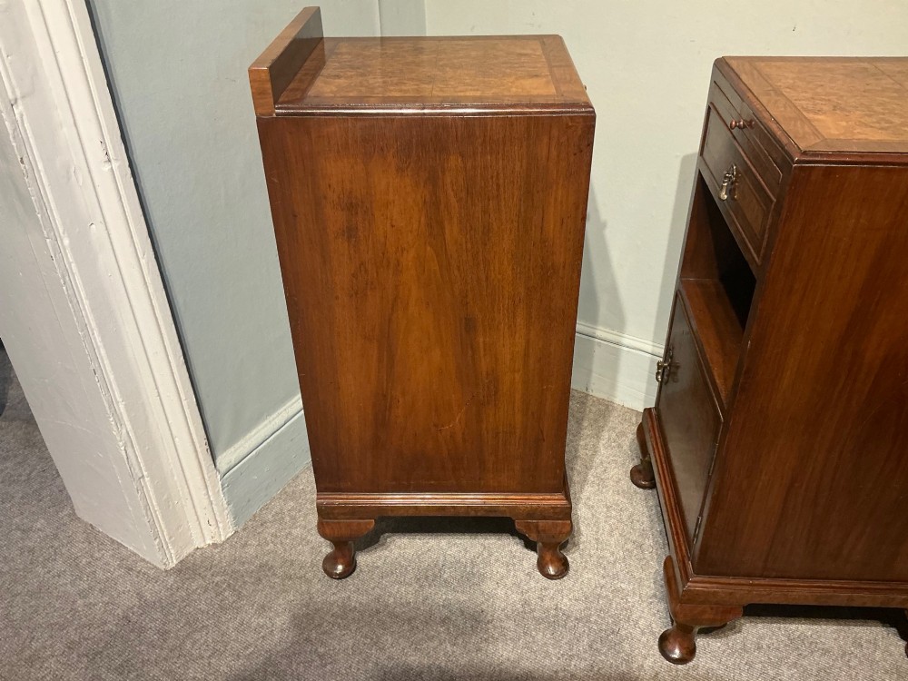 A matching pair of burr walnut bedside cabinets featuring pull-out slides, single drawers, open cubbies, lower cupboard doors, and cabriole legs. View VIII