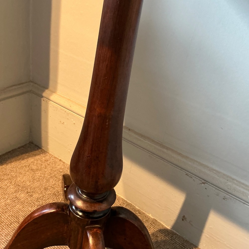 An antique dark wood pedestal chess table featuring an inlaid checkerboard surface top and a turned stem on four splayed legs. View VI