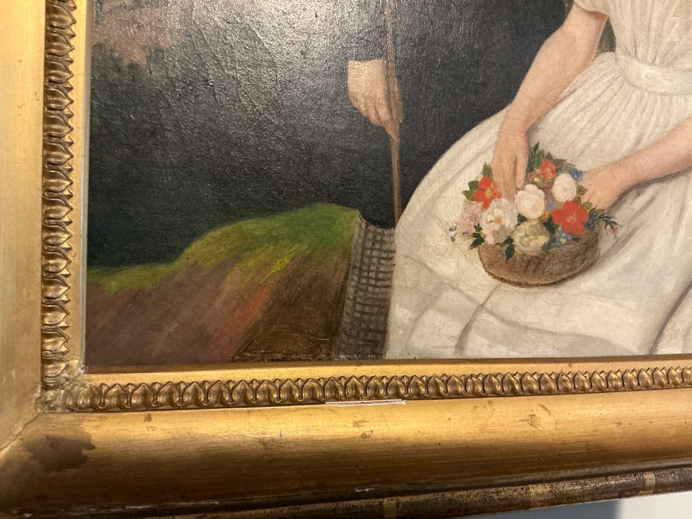 An early 19th-century oil painting depicting a boy in black clothing and a girl in a white dress seated outdoors, set within a gilded moulded frame. View VII