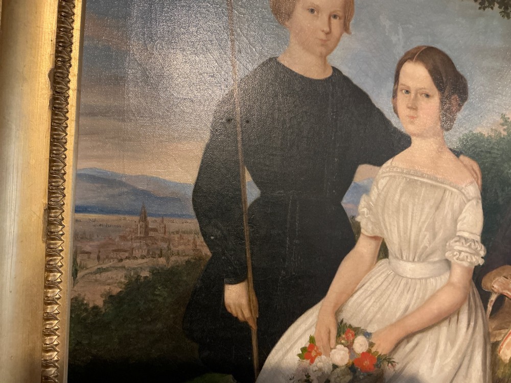 An early 19th-century oil painting depicting a boy in black clothing and a girl in a white dress seated outdoors, set within a gilded moulded frame. View VIII