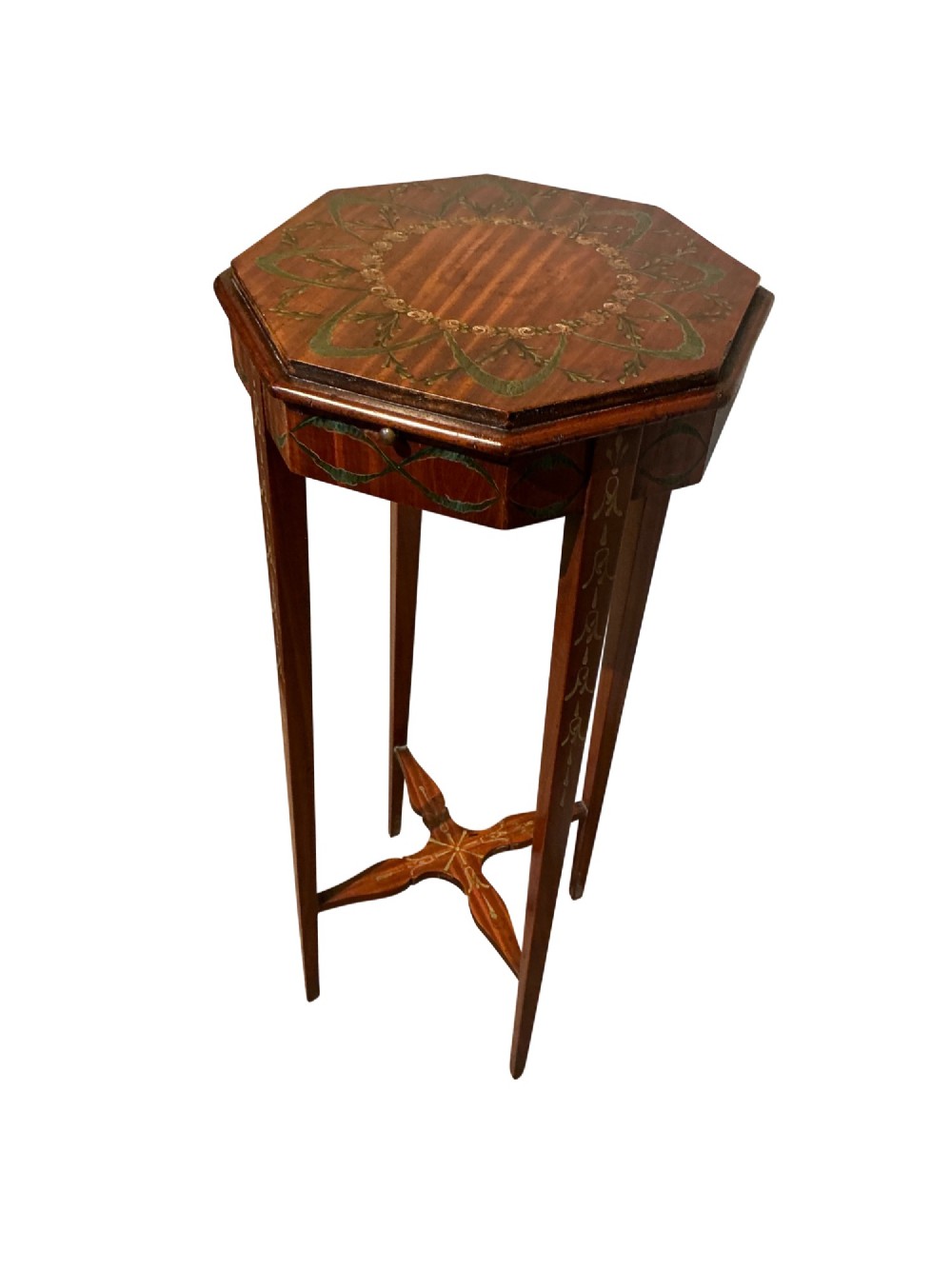 An octagonal antique satinwood urn stand featuring hand-painted floral garlands, a pull-out slide, slender tapered legs, and an X-shaped cross stretcher.