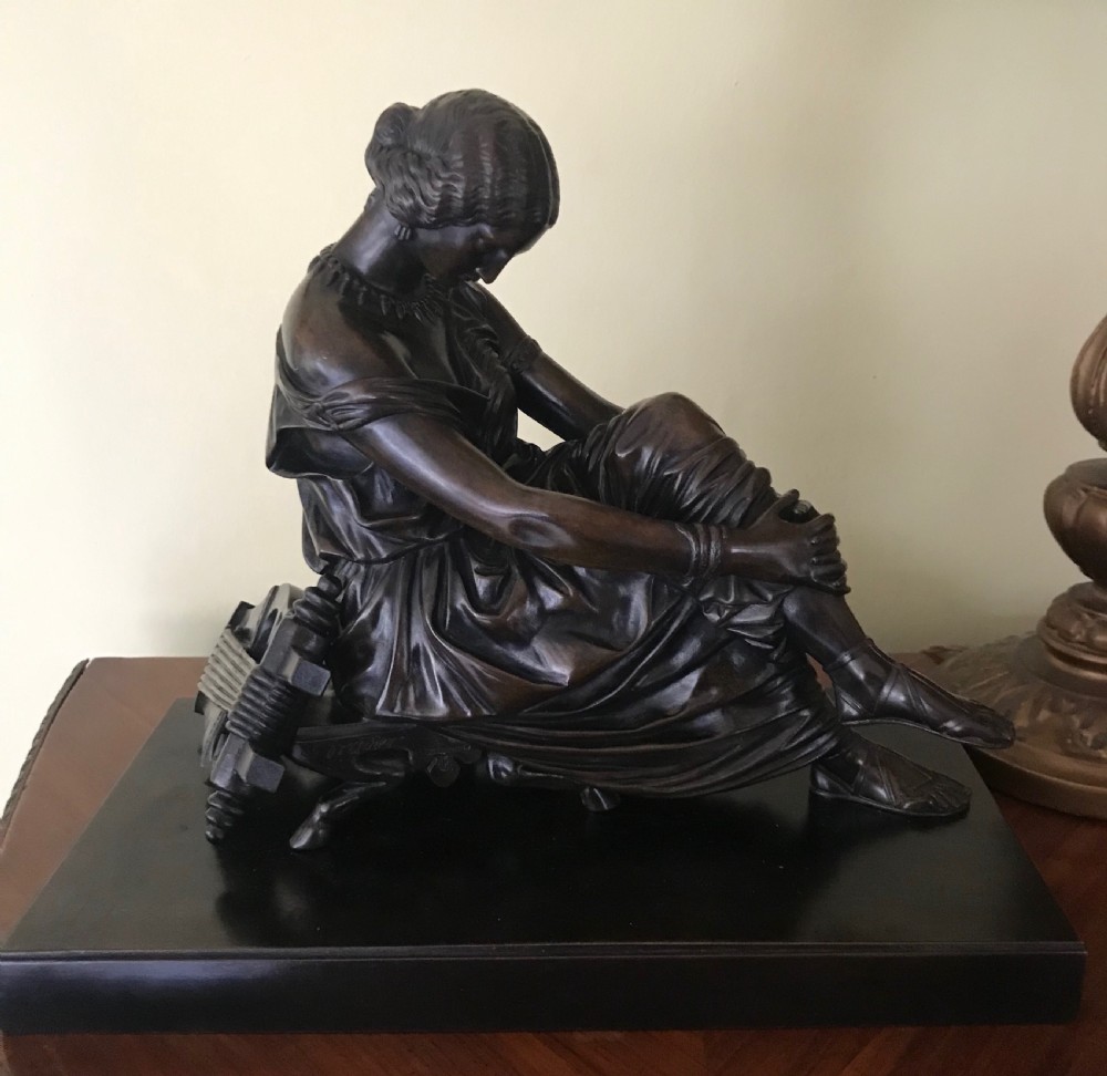 A 19th century bronze of seated Sappho by Jean-Jacques Pradier 