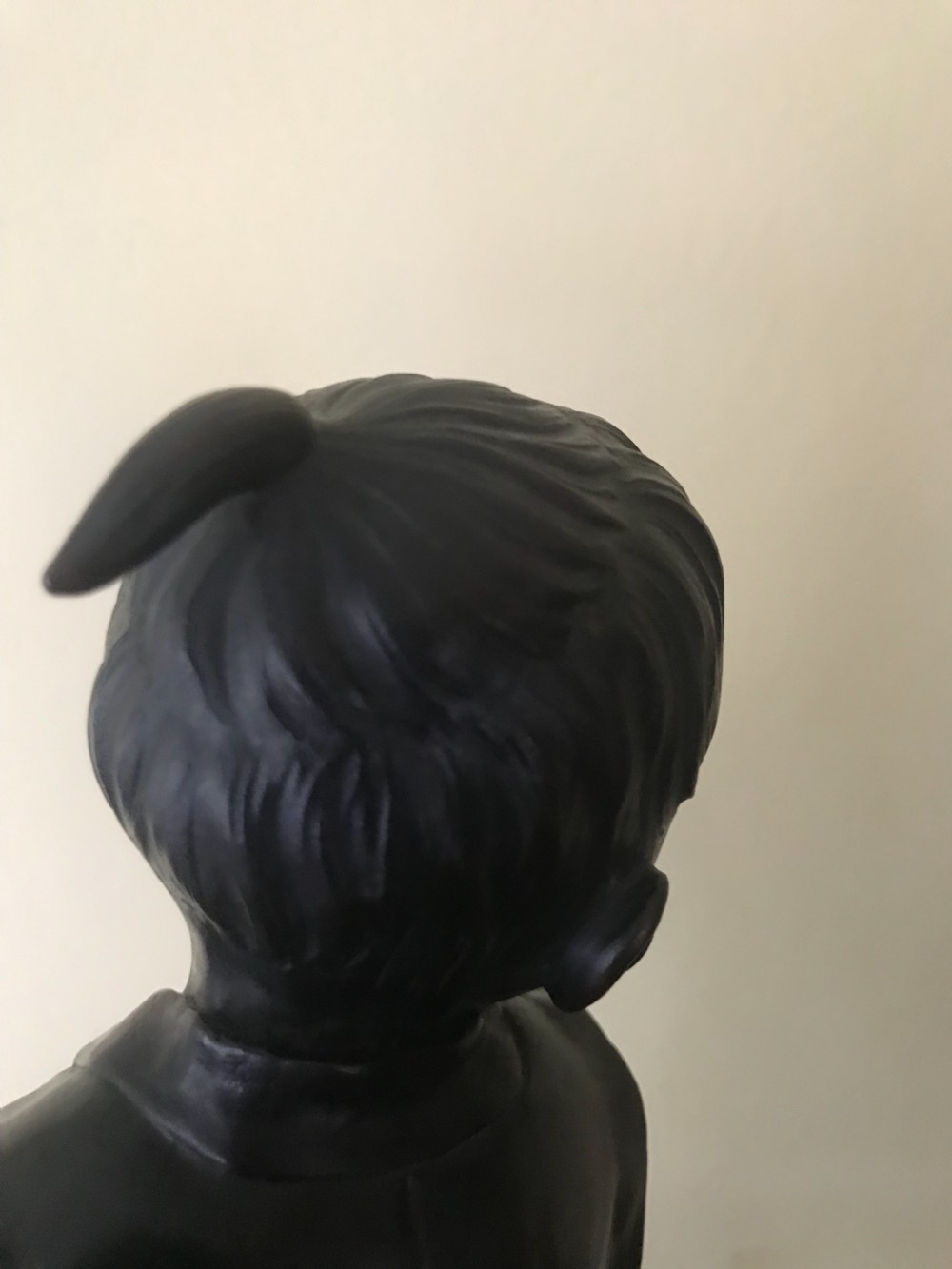 A dark bronze Japanese okimono sculpture depicting a boy in traditional kimono and geta sandals walking beside a chicken on a cast naturalistic base. View V