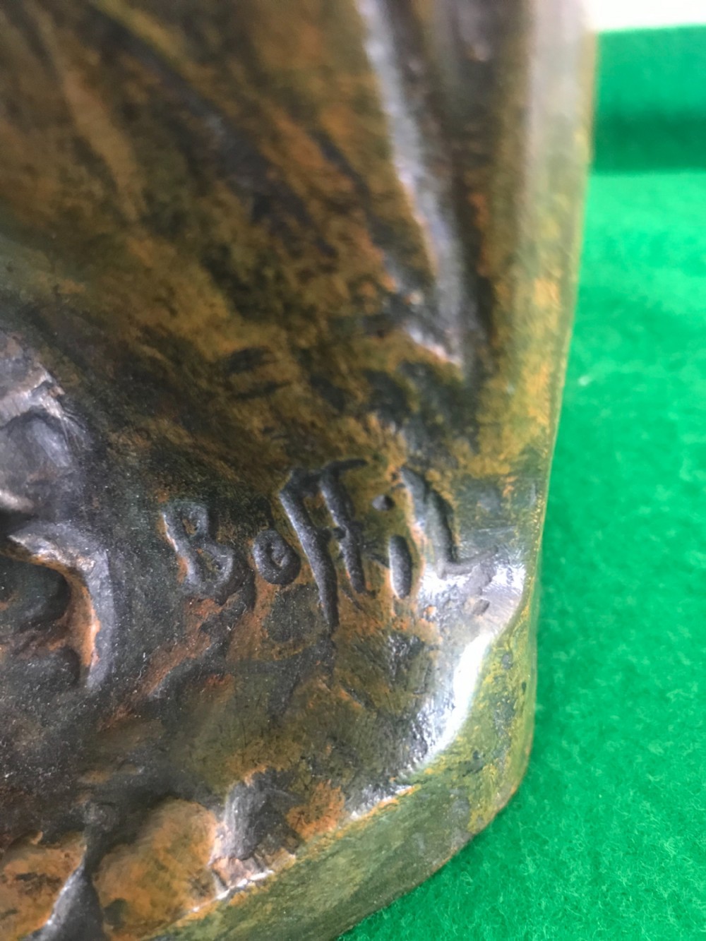 An antique patinated and silvered bronze sculpture depicting three children playing near a stream with a family of ducks, signed by Antoine Bofill. View IV