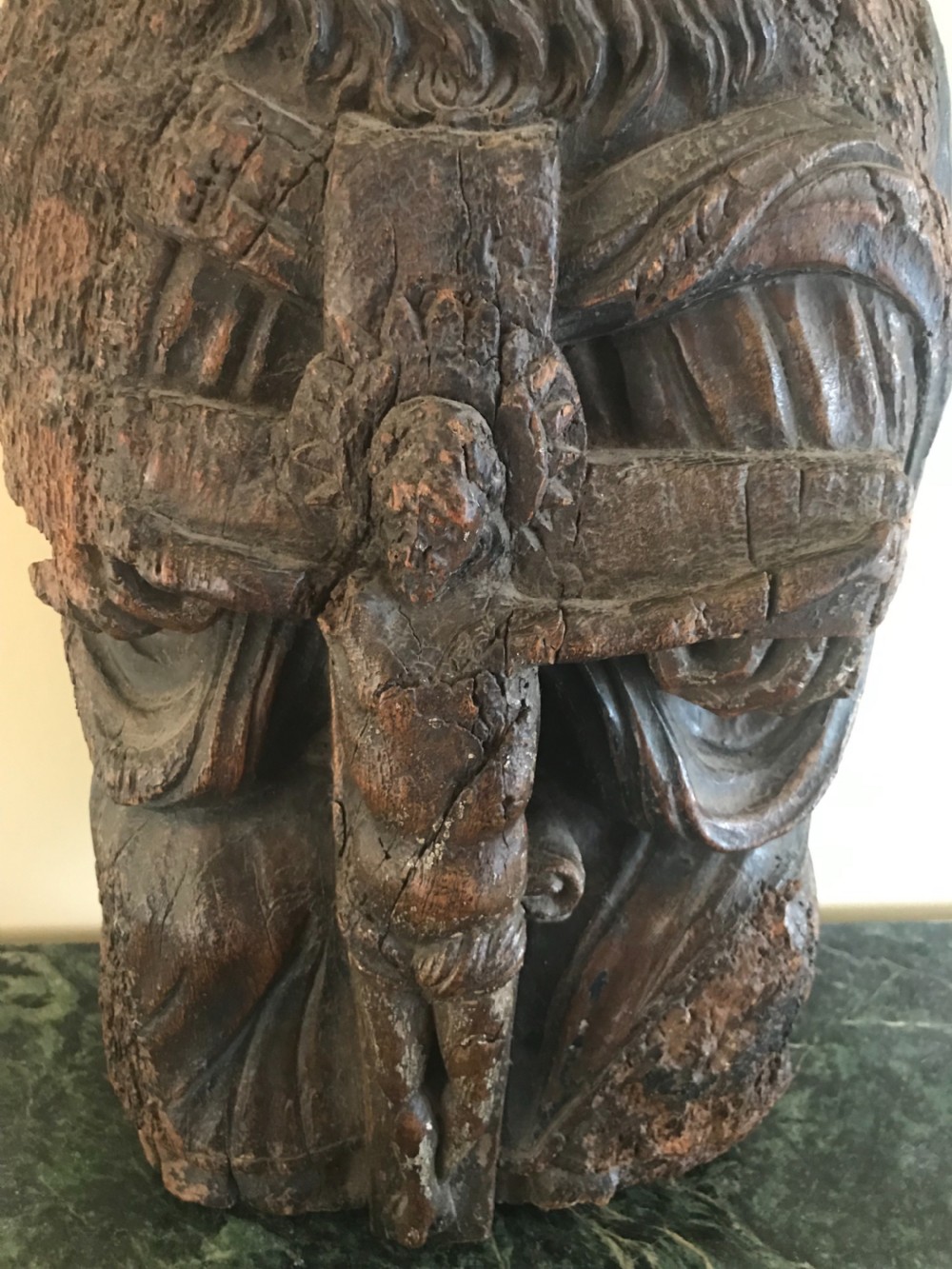 A 15th-century hand-carved oak sculpture depicting a bearded figure wearing a papal tiara and holding a crucifix. View III