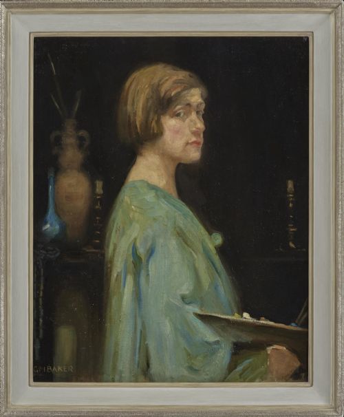 fig 1. An early 20th-century oil painting depicting a female artist in a green smock with bobbed hair holding a palette against a dark background.