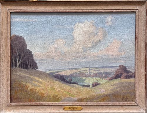 fig 1. An oil painting depicting rolling countryside hills with a cathedral spire in the distance under a pale blue sky, signed by Eric Brown.