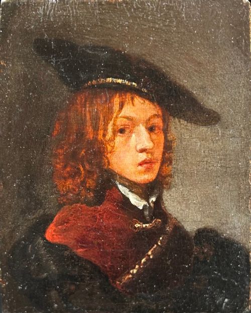 fig 1. An antique oil portrait depicting a young man wearing a wide-brimmed cap, presented within a multi-moulded black ebonised frame.