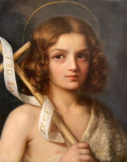 fig 1. An Italian school oil portrait depicting a young Saint John the Baptist holding a reed cross with a Latin banner, set within an ornate carved giltwood frame.