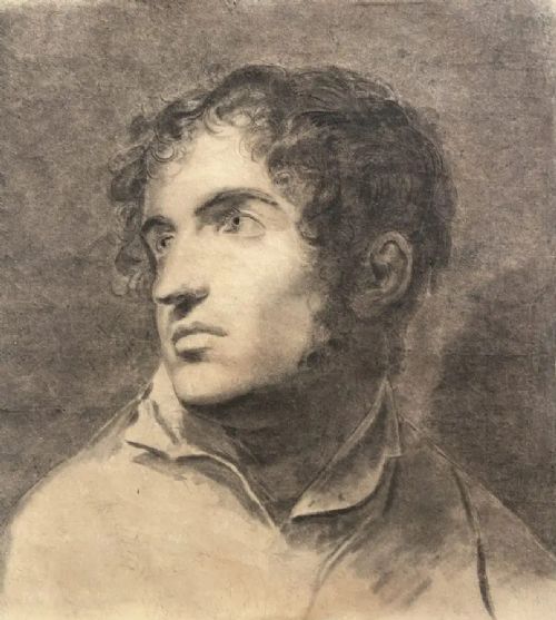 fig 1. A framed monochrome charcoal drawing of a young man with curly hair facing left, enclosed in a moulded gilt and ebonised frame.